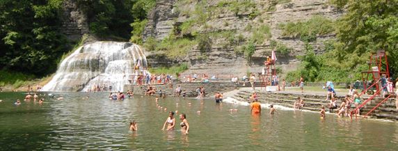 swimming by the waterfall